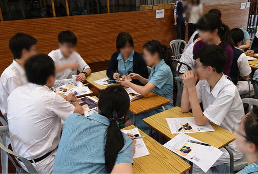 Students working together in class