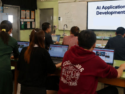 Students in an AI application workshop